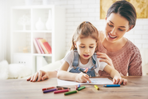 mom helping child with homework children's stuttering speecheasy